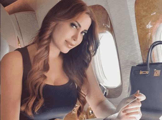 اتفرج – نسرين طافش تستعرض مفاتنها بالأحمر الشفاف في نهار رمضان