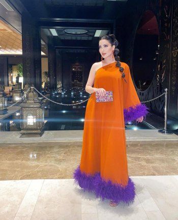 شاهد .. إطلالة نسرين طافش ملفتة للأنظار.. هكذا نسقت اللونين البرتقالي والبنفسجي