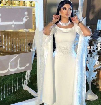 شاهد .. ملكة كابلي تبدو كالعروس في احتفال عيد ميلادها الفخم-بالصور