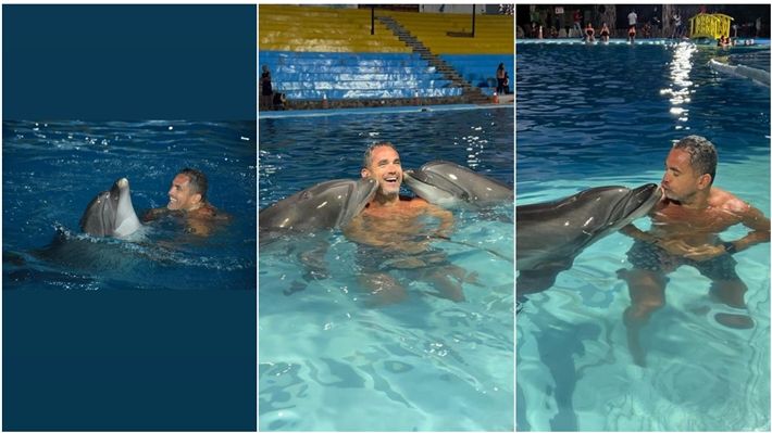 بالصور – أمير كرارة بيرقص مع الدلافين في حمام السباحة