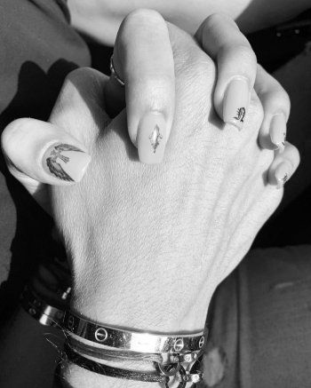 شاهد .. نادين نسيب نجيم تحدث ضجة واسعة بصورة مع رجل غامض.. فهل كشفت عن قصة حب جديدة؟