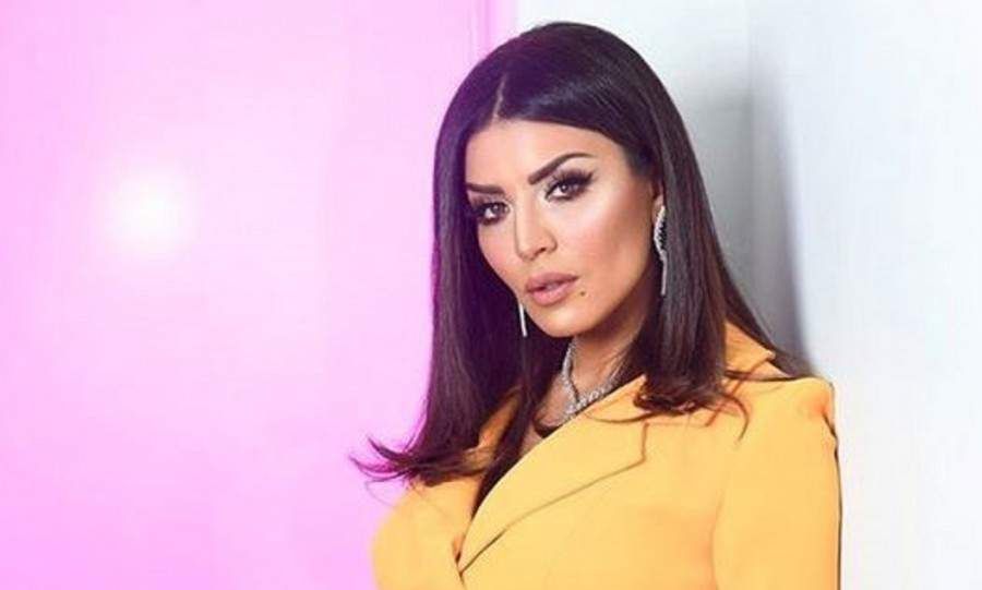 شاهد .. بالصور - أمل بوشوشة بإطلالة رائعة باللون الوردي كم يبلغ سعر حقيبة يدها؟