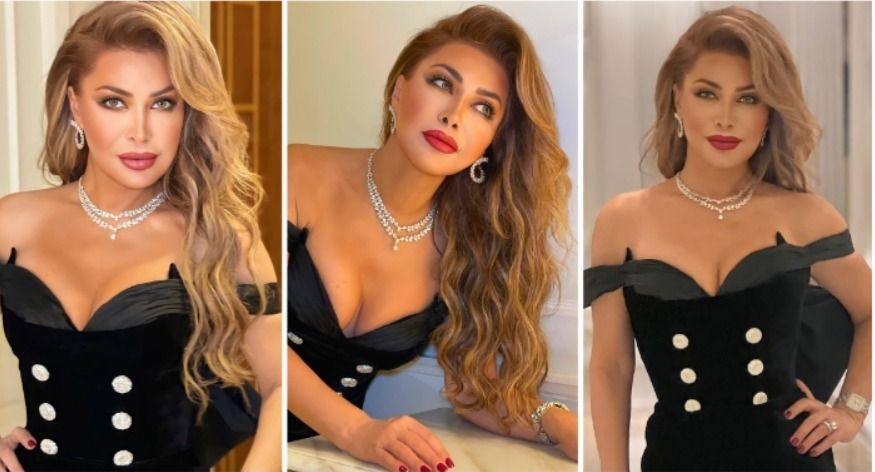 زراير فستان نوال الزغبي طارت كلها : الحقي الي وقع منك يافنانة !!