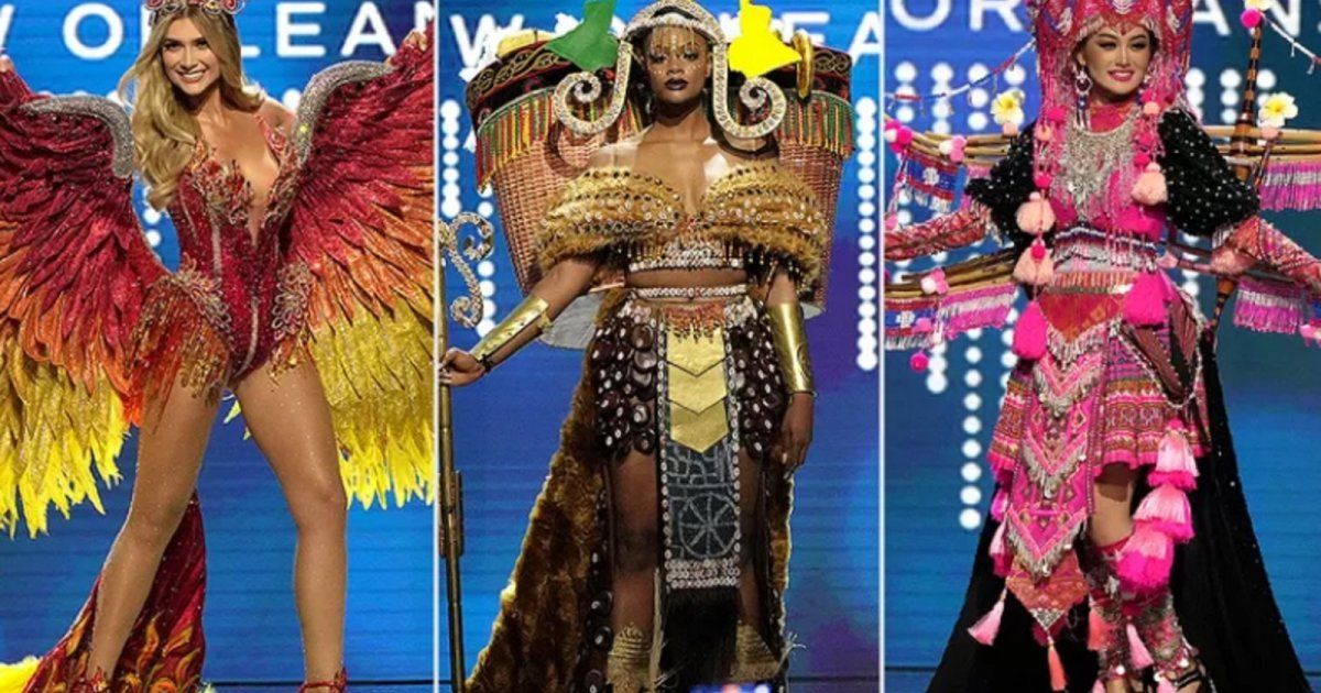 شاهد .. بالصور - ملكة جمال بريطانيا تكرم الملكة إليزابيث وملكة جمال روسيا تدعو للسلام من خلال الزي الذي إختارته