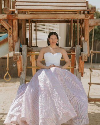 شاهد .. لقاء الخميسي تثير الجدل بجلسة تصوير بفستان أبيض يشبه فساتين الزفاف-بالصور