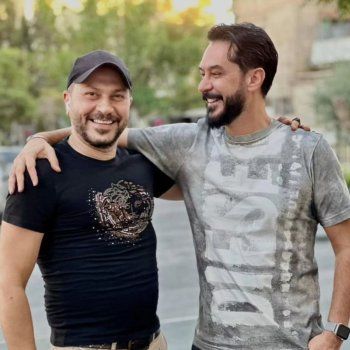 شاهد .. معتز وعصام يجتمعان بعد 13 عاماً-بالصور