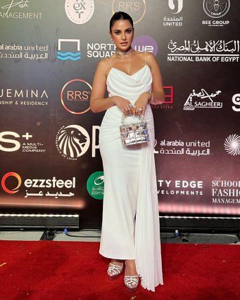 شاهد .. إليكم سعر فستان درة الأبيض في عرض أزياء مايكل سينكو