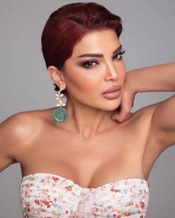 شاهد .. بعد شفائها من السرطان.. أول ظهور لـ دينا حايك بالشعر القصير