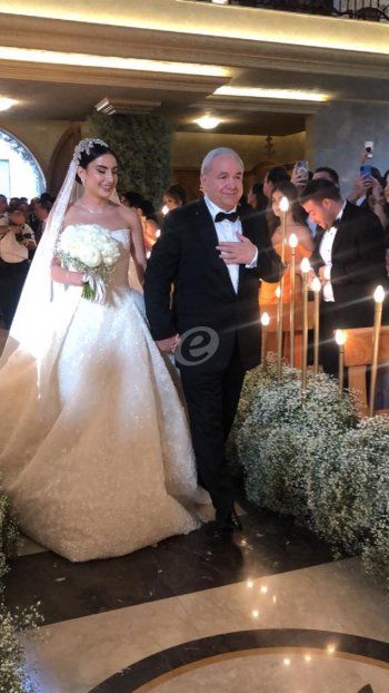 شاهد .. الصورة الأولى من إكليل ماريا إلياس المر وإيلي أبو ناضر في كنيسة مار يوسف بسكنتا