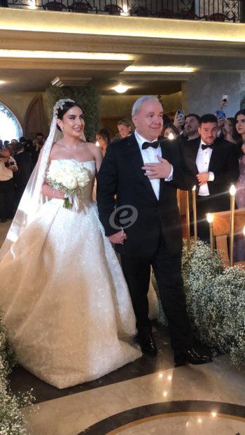 شاهد .. الصورة الأولى من إكليل ماريا إلياس المر وإيلي أبو ناضر في كنيسة مار يوسف بسكنتا