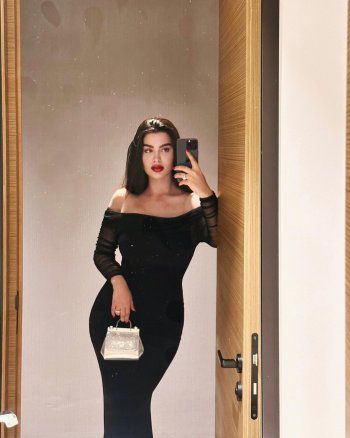 شاهد .. بفستان أسود ضيق..روان بن حسين تستعرض أنوثتها ورشاقة جسمها - بالصور