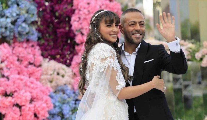 بإطلالة ساحرة.. نانسي نور تخطف الأنظار في حفل زفافها على تامر عاشور