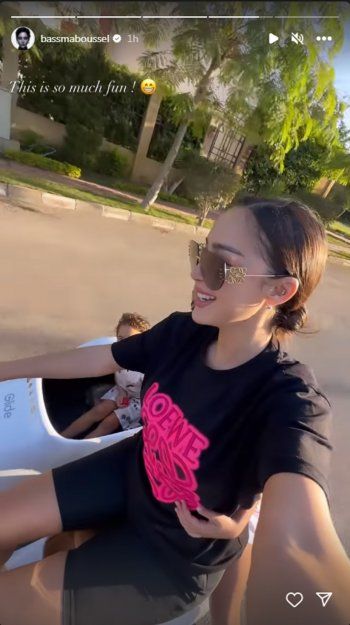 شاهد .. بالصور- في لحظات من الفرح..بسمة بسيل تقود الدراجة النارية مع أولادها