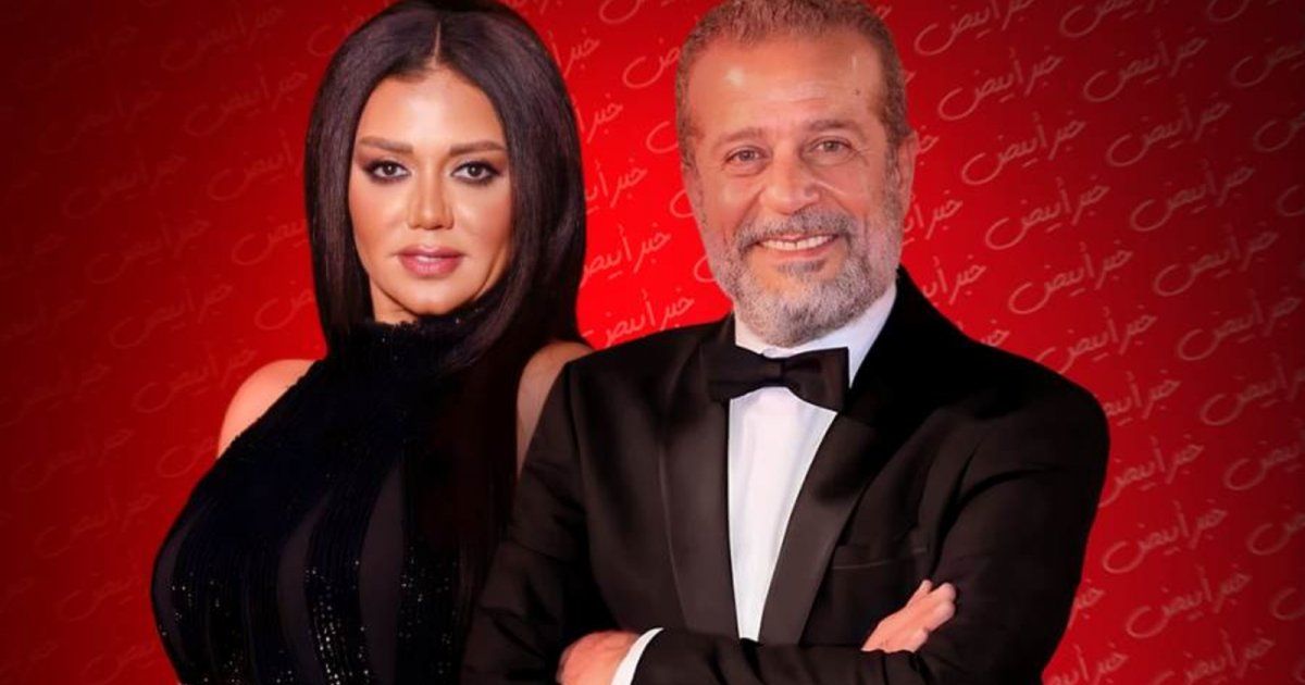 شاهد .. رانيا يوسف وشريف منير بملابس الفورمولا وان من كواليس مسلسل "بقينا اتنين"