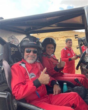 شاهد .. رانيا يوسف وشريف منير بملابس الفورمولا وان من كواليس مسلسل "بقينا اتنين"