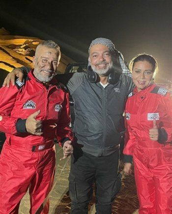 شاهد .. رانيا يوسف وشريف منير بملابس الفورمولا وان من كواليس مسلسل "بقينا اتنين"