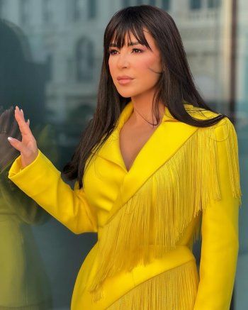 شاهد .. ماغي بو غصن تتألق بالأصفر في إطلالتها الثالثة في مهرجان البحر الأحمر