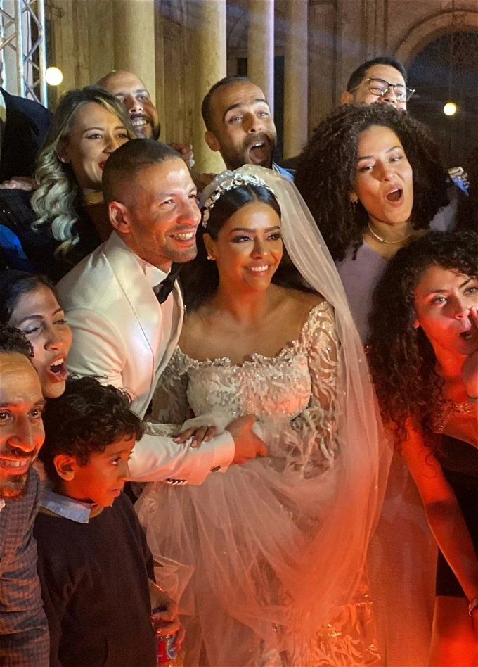 الظهور الأول لحفل زفاف أسماء أبو اليزيد ومحمد الخطيب.. ماذا قال نجوم الفن؟
