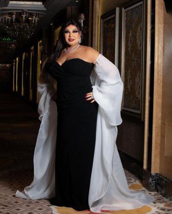 شاهد .. بالصور- بفستان سواري أسود ولمسة بيضاء.. فيفي عبده تتألق بلوك مميز