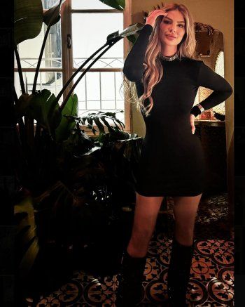 شاهد .. بالصور- ساندرا رزق تبهر المتابعين بجمالها بفستان أسود مكشوف الظهر