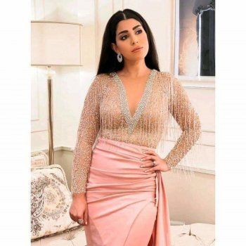 شاهد .. إليكم صور الفستان الذي سبب أزمة بين سمية الخشاب وأيتن عامر !