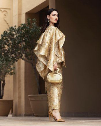 شاهد .. بالصور- روان بن حسين تبهر المتابعين بالذهبي الأنيق