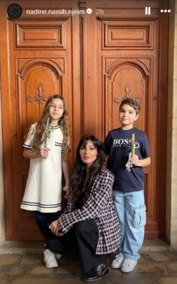 شاهد .. جيوفاني وهيفين يسرقان الأضواء من والدتهما نادين نسيب نجيم في أحد الشعانين-بالصور