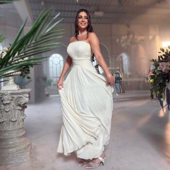 شاهد .. بالصور- ميرنا نور الدين تخطف القلوب بفستانها الأبيض