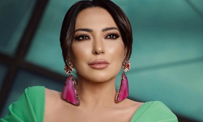 شاهد .. أمل عرفة :"مساحة الفرح قد ضاقت ولكن"