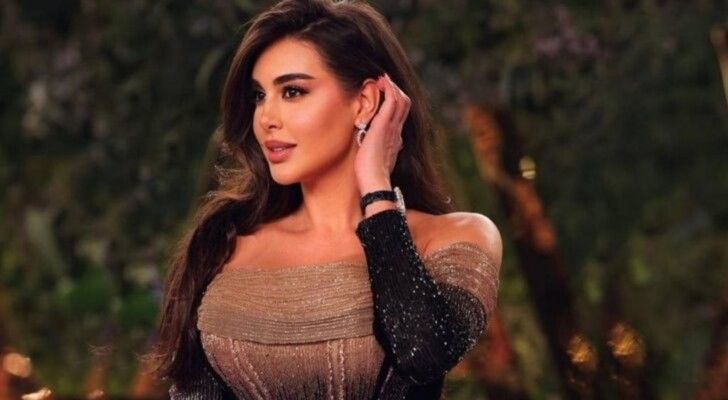 شاهد .. ياسمين صبري تخطف الانظار بفستانها الأبيض على شواطئ جزر المالديف