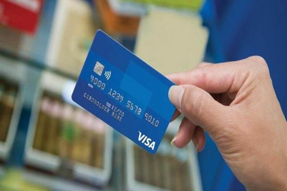البنك الأهلي يكشف حقيقة إيقاف بطاقات الصرف الآلي