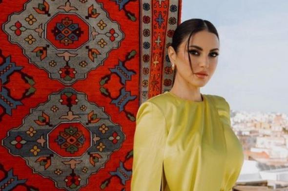 شاهد .. درة التونسية تتألق بفستان رائع من تصميم Elisabetta Franchi وهذا سعره